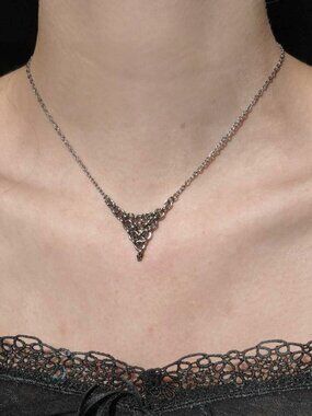 V shaped chain mail necklace with a small silver chain